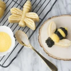 Stampo BACKYARD BUGS 38x28,9cm H4,5cm 8 Impronte NW53037 Nordic Ware -Peroni Kitchen Negozio stampo backyard bugs 2